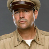 Kyle Chandler — Colonel Cathcart