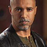 Damian T. Raven — Dr. Estaban Cruz