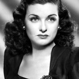 Joan Bennett — Elizabeth Collins Stoddard / Naomi Collins