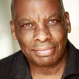 Don Warrington — Priest of Offler
