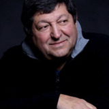 Mouzinho Arsénio — Dono da Mercearia