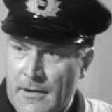 Howard Lang — Captain Baines