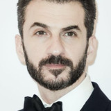 Michael Aronov — Dr. Nima Rousseau