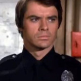 Robert Urich — Officer Jim Street