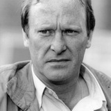 Dennis Waterman — Det. Sgt. George Carter