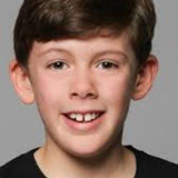 Louis Wint — Wilson (Vocals)